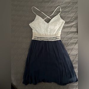 Crochet-trimmed lace overlay dress